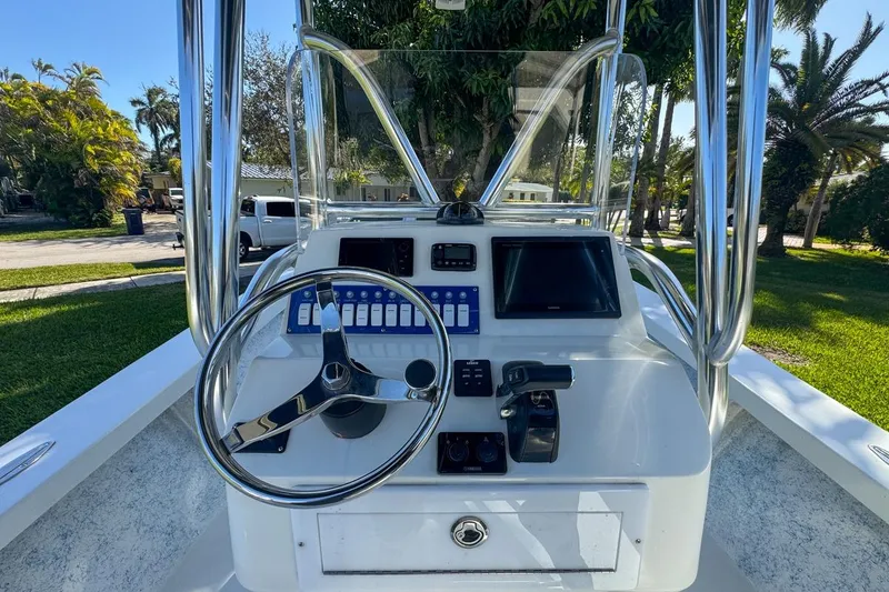 Slide: The Image of 1972 Cuda Craft Open Fisherman boat console with steering wheel and controls. - 23