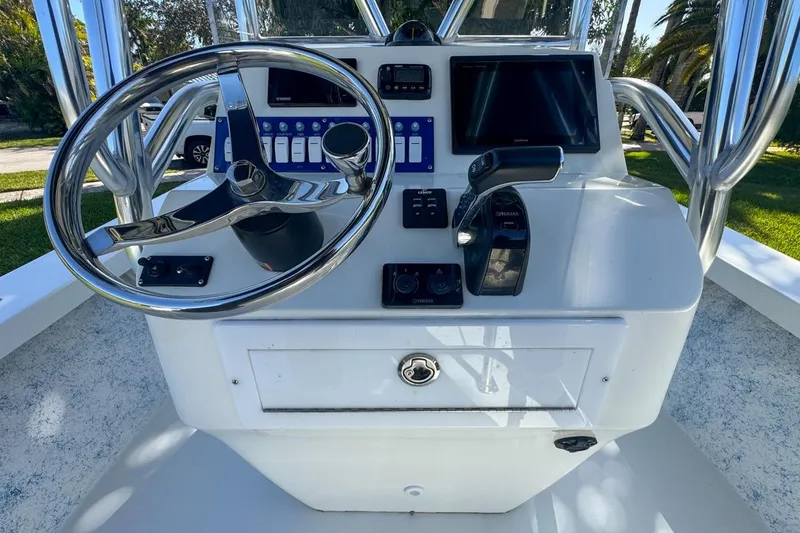 Slide: The Image of 1972 Cuda Craft Open Fisherman boat console with steering wheel and controls. - 25