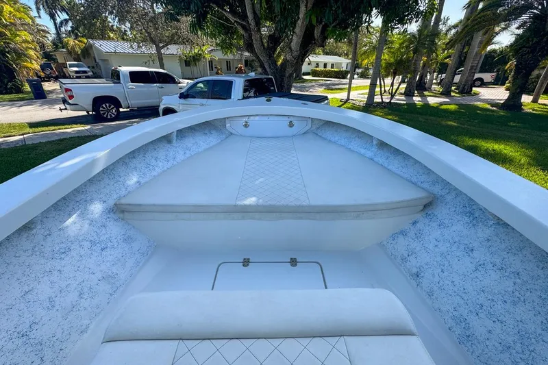 Slide: The Image of 1972 Cuda Craft Open Fisherman boat interior with white seating and textured sides. - 30