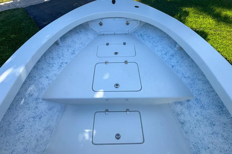 Slide: The Image of 1972 Cuda Craft Open Fisherman boat deck with storage compartments. - 35