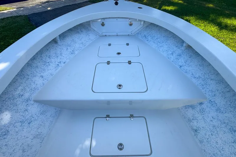 Slide: The Image of 1972 Cuda Craft Open Fisherman boat deck with storage compartments. - 36