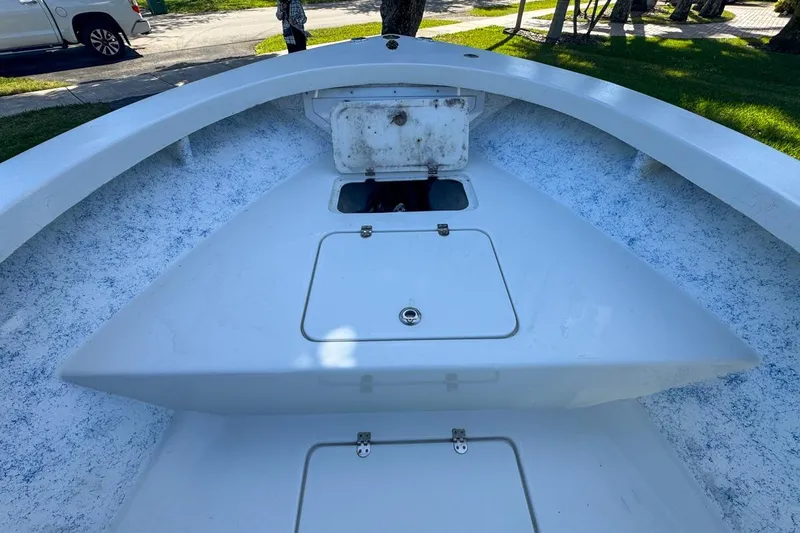 Slide: The Image of 1972 Cuda Craft Open Fisherman boat deck with storage compartments. - 39