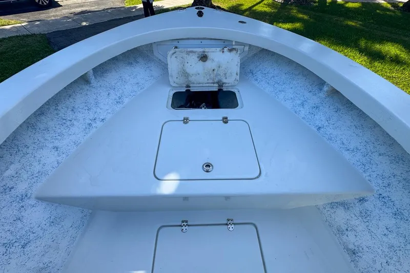 Slide: The Image of 1972 Cuda Craft Open Fisherman boat deck with storage compartments. - 40