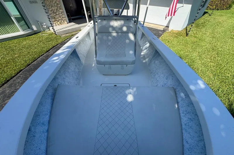 Slide: The Image of 1972 Cuda Craft Open Fisherman boat interior with seating and American flag. - 45