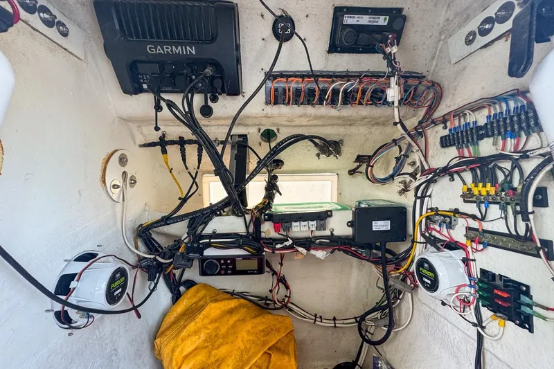 Slide: The Image of 1972 Cuda Craft Open Fisherman boat wiring and electronics setup with Garmin equipment. - 54