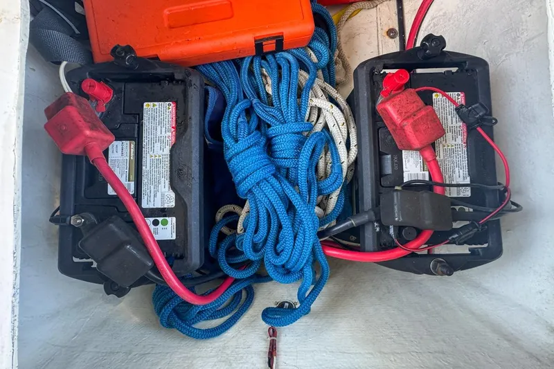 Slide: The Image of Batteries and ropes in 1972 Cuda Craft Open Fisherman boat compartment. - 55