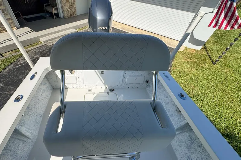 Slide: The Image of 1972 Cuda Craft Open Fisherman boat with Yamaha 200 engine and cushioned seating. - 60