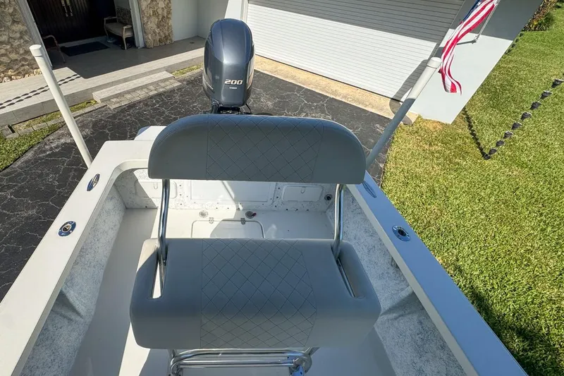 Slide: The Image of 1972 Cuda Craft Open Fisherman boat with modern seating and outboard motor. - 62