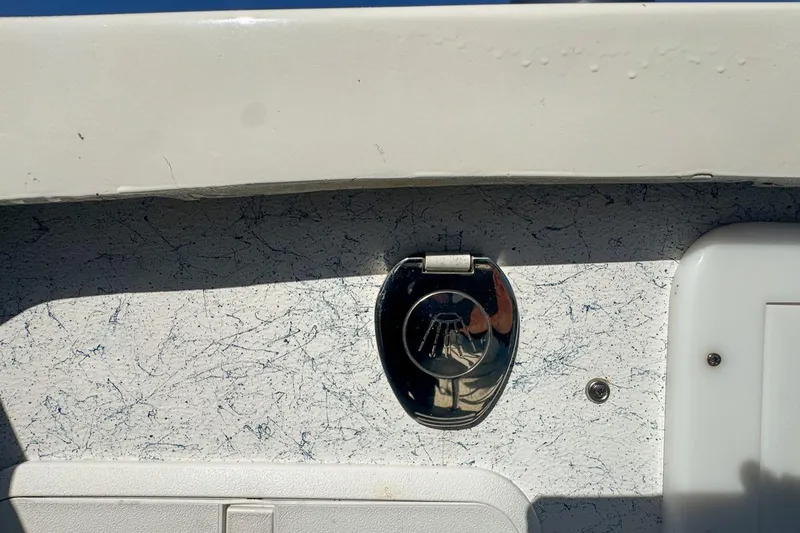 Slide: The Image of 1972 Cuda Craft Open Fisherman boat detail with chrome fixture and textured surface. - 68