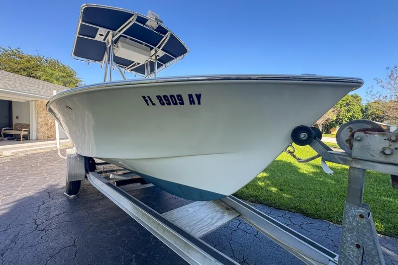 Slide: The Image of 1972 Cuda Craft Open Fisherman boat on trailer, parked in driveway. - 9