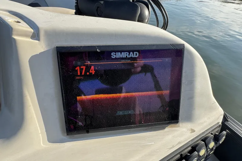 Slide: The Image of Simrad display on 2021 Barletta C22CC boat showing depth reading. - 27