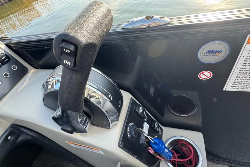 Slide: The Image of 2021 Barletta C22CC boat control panel with throttle and switches. - 29