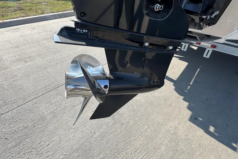 Slide: The Image of Close-up of a 2021 Barletta C22CC boat propeller on a sunny day. - 9