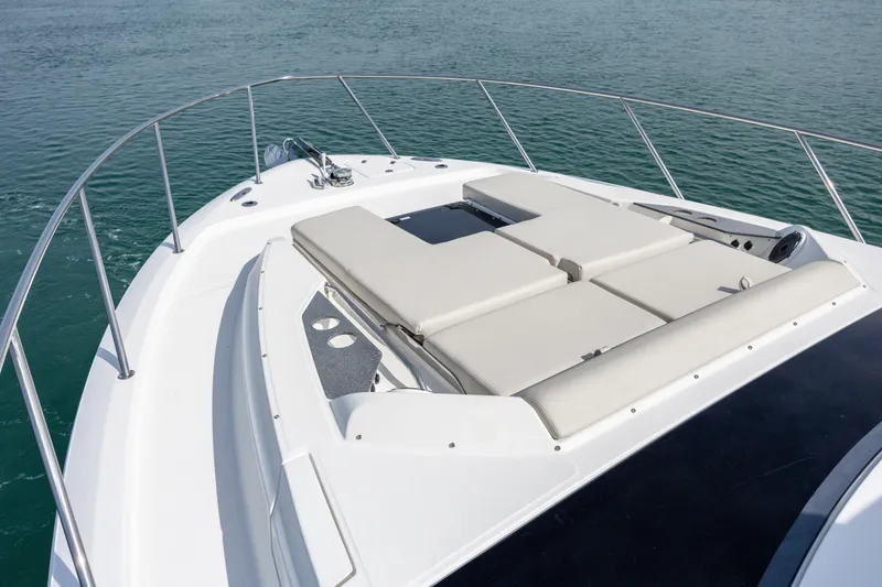 Slide: The Image of Modern kitchen area in 2021 Boston Whaler 405 Conquest boat, featuring stove and sink. - 10