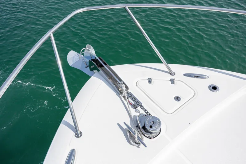 Slide: The Image of Cozy cabin interior of 2021 Boston Whaler 405 Conquest with bed and modern lighting. - 12