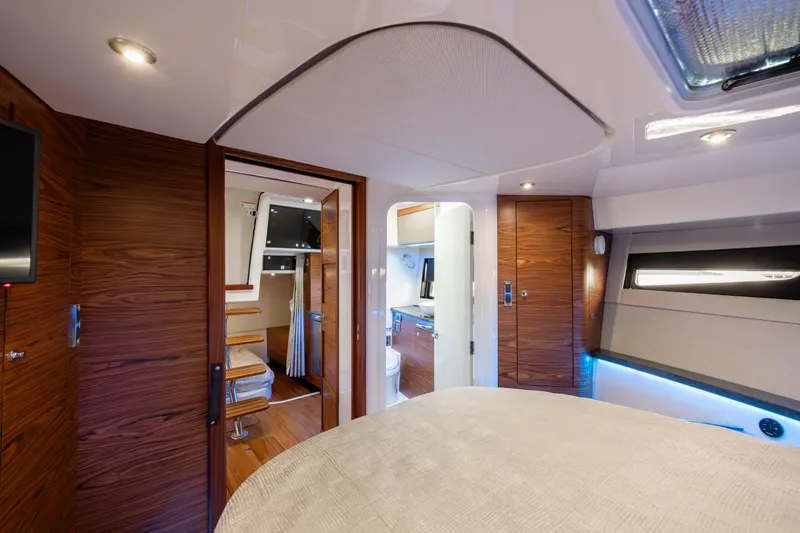 Slide: The Image of Modern bathroom in 2021 Boston Whaler 405 Conquest boat, featuring sleek design and amenities. - 26