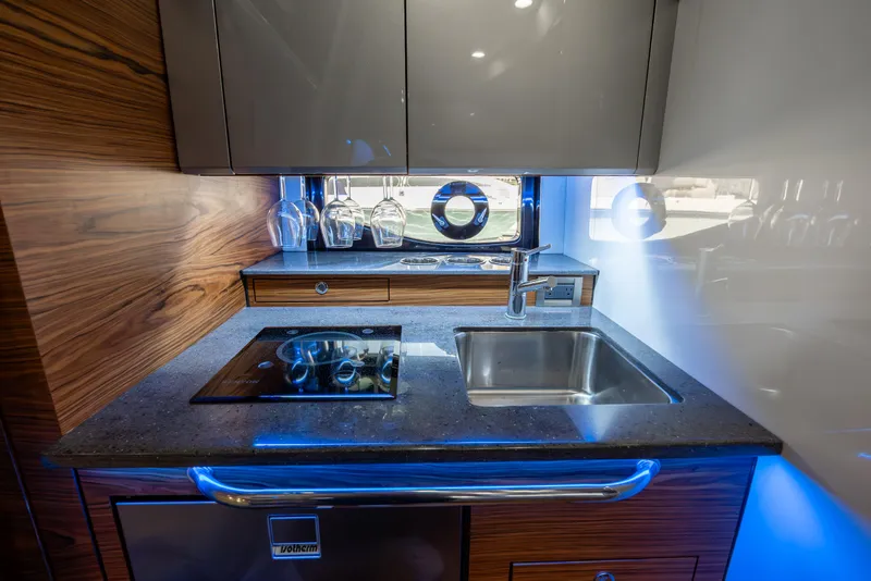 Slide: The Image of Boston Whaler 405 Conquest 2021 helm with navigation system. - 6