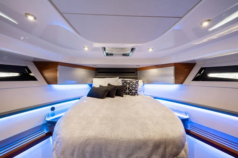 Slide: The Image of 2021 Boston Whaler 405 Conquest helm with modern controls and displays. - 7