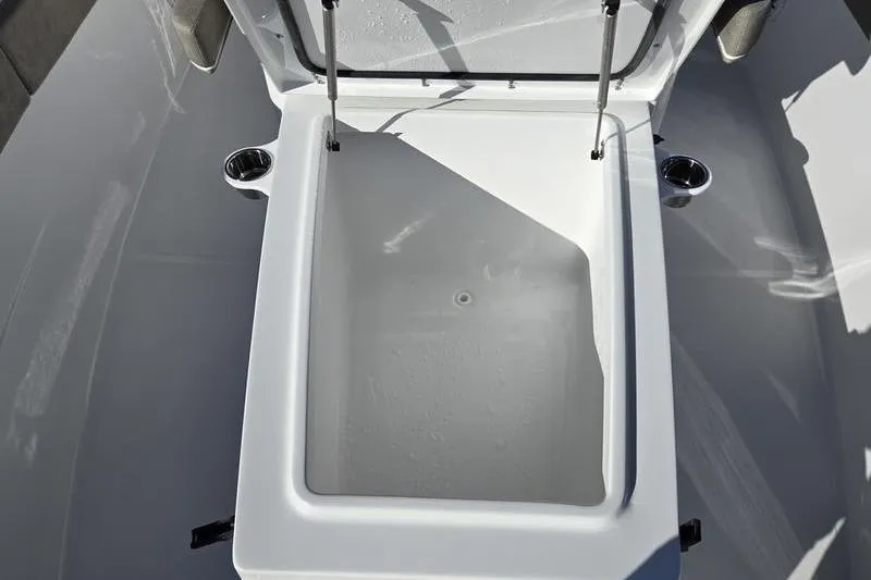 Slide: The Image of 2026 Sea Hunt Ultra 275 Coffin Box interior view, open lid, spacious storage. - 13