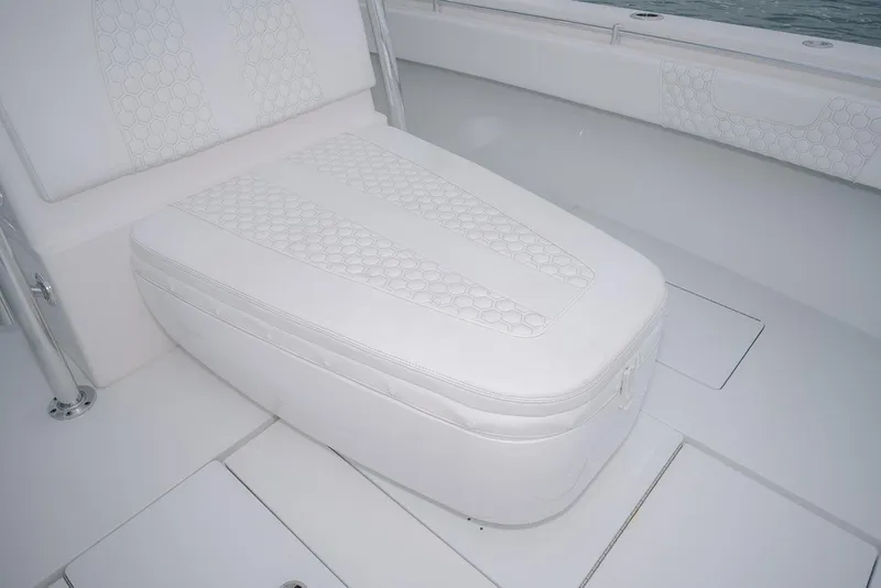 Slide: The Image of 2023 Contender 39 ST boat seat with hexagonal pattern upholstery. - 24