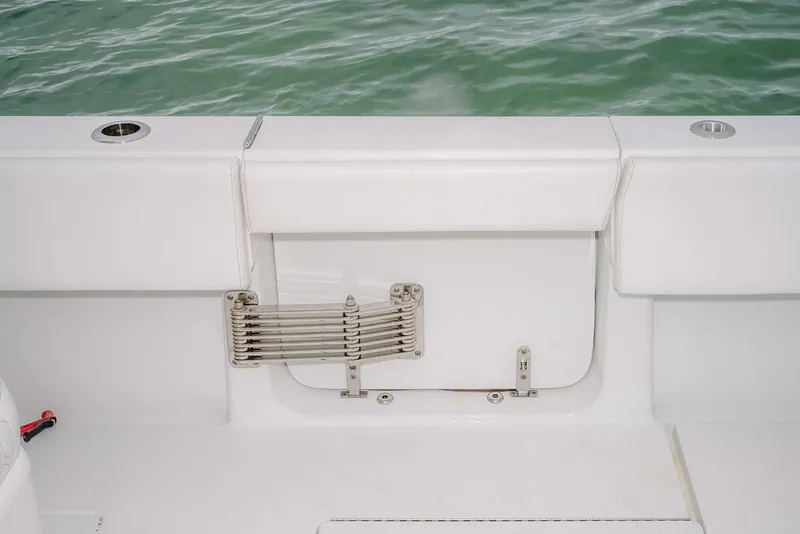 Slide: The Image of 2023 Contender 39 ST boat with white seating and stainless steel hardware. - 35