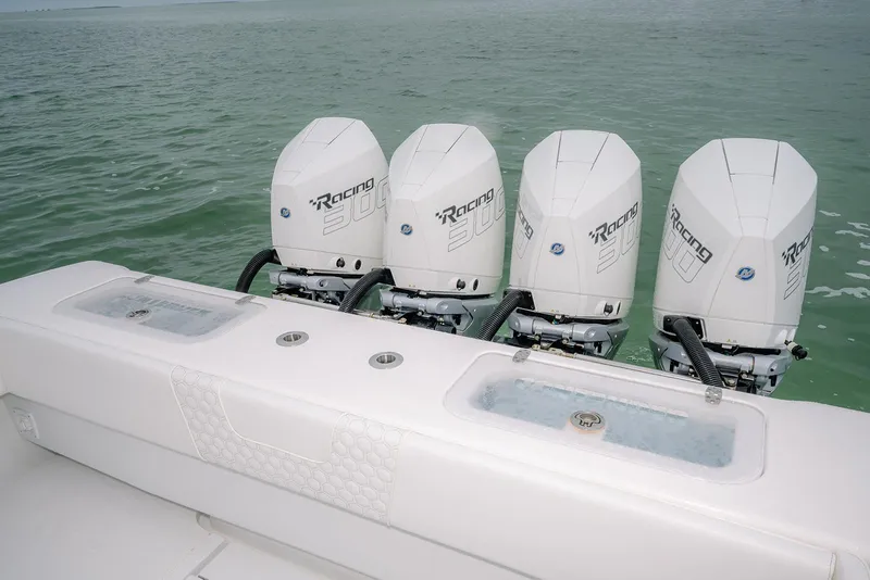 Slide: The Image of 2023 Contender 39 ST boat with four powerful Racing 300 outboard engines. - 36