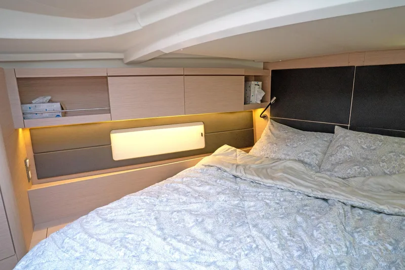 Slide: The Image of Luxurious cabin interior of 2022 Beneteau Oceanis 461 yacht with cozy bedding. - 21