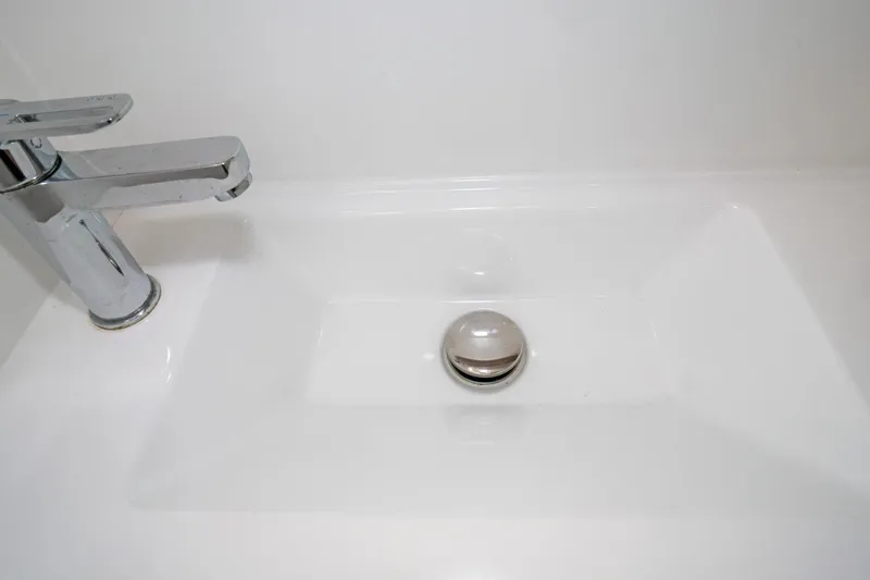 Slide: The Image of Modern sink and faucet on Beneteau Oceanis 461 yacht, 2022 model. - 25