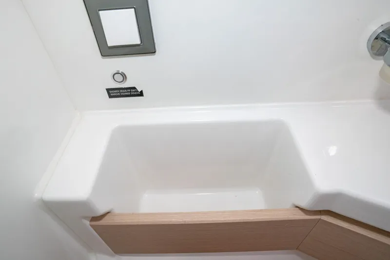 Slide: The Image of Beneteau Oceanis 461 2022 yacht bathroom sink with modern design and sleek fixtures. - 30