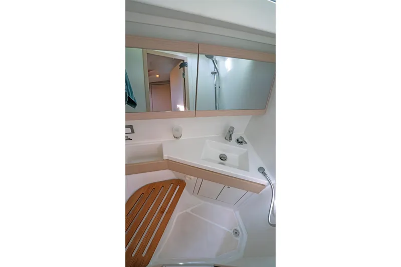 Slide: The Image of Bathroom interior of 2022 Beneteau Oceanis 461 yacht, featuring modern sink and shower. - 32