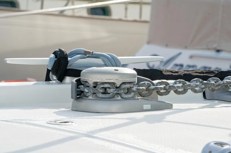 Slide: The Image of Anchor chain and ropes on a 2022 Beneteau Oceanis 461 yacht deck. - 40