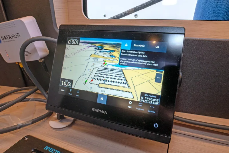 Slide: The Image of Garmin navigation display on 2022 Beneteau Oceanis 461 yacht, showing chart updates and GPS position. - 43