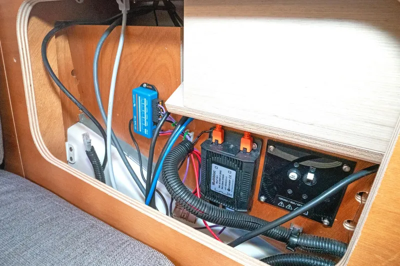 Slide: The Image of Electrical wiring and components inside a 2022 Beneteau Oceanis 461 yacht. - 45
