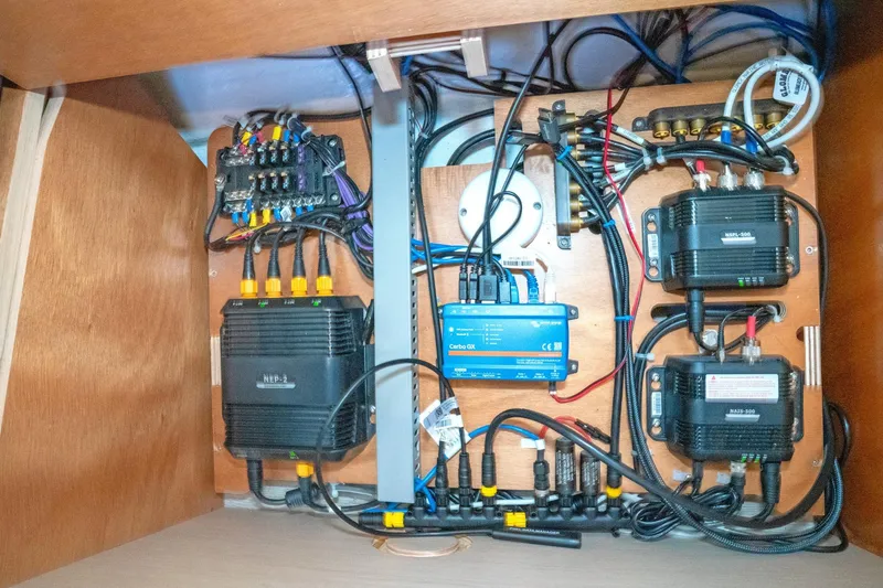 Slide: The Image of Electrical panel of 2022 Beneteau Oceanis 461 yacht, showcasing wiring and components. - 47
