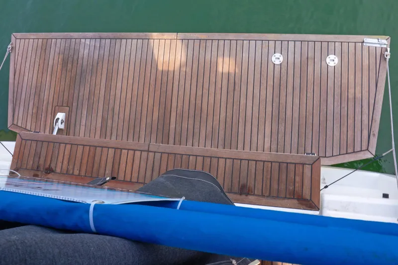 Slide: The Image of Teak deck of 2022 Beneteau Oceanis 461 sailboat, viewed from above. - 65
