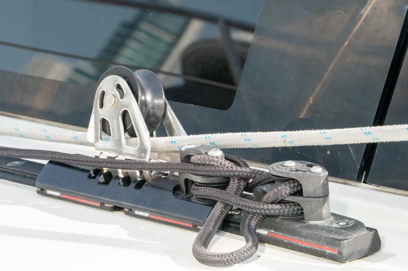 Slide: The Image of Close-up of Beneteau Oceanis 461 sailboat rigging, featuring Harken hardware, 2022 model. - 68