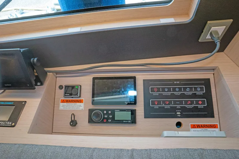 Slide: The Image of Control panel of 2022 Beneteau Oceanis 461 yacht with navigation and warning systems. - 69