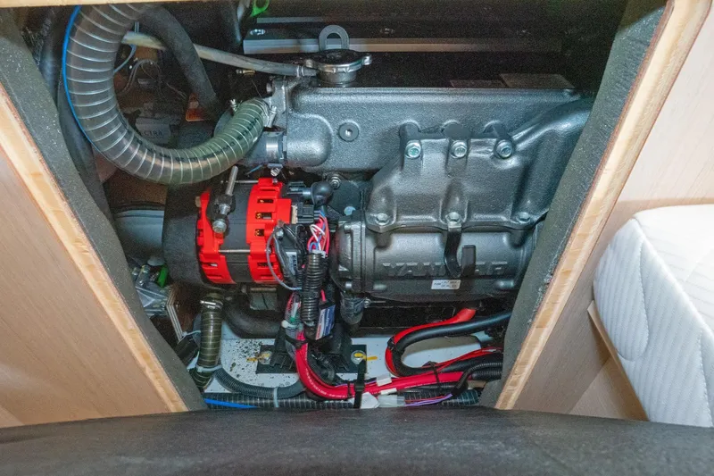 Slide: The Image of Engine compartment of a 2022 Beneteau Oceanis 461 sailboat, showcasing mechanical components. - 8