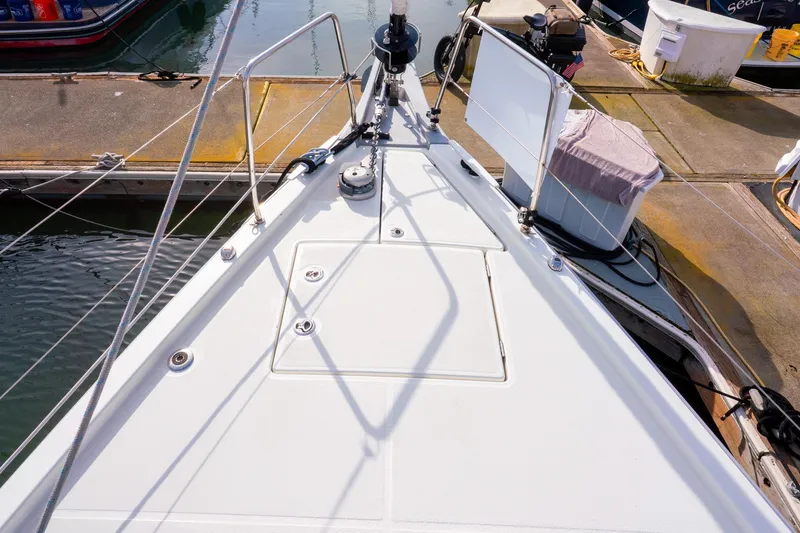 Slide: The Image of Bow of 2022 Beneteau Oceanis 461 yacht docked at marina. - 82