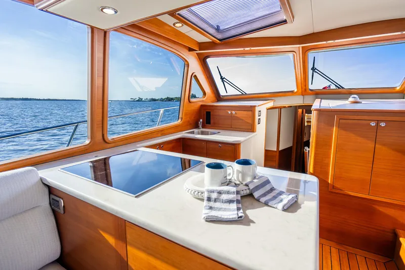 Slide: The Image of Luxurious interior of 2020 Palm Beach Motor Yachts PB55 with ocean view. - 11