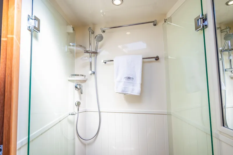 Slide: The Image of Luxurious shower in 2020 Palm Beach Motor Yachts PB55, featuring modern fixtures and elegant design. - 26