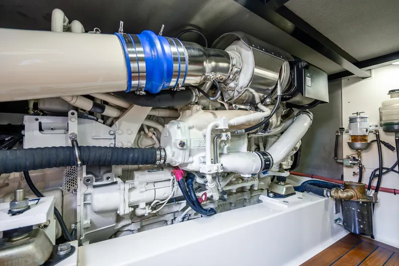 Slide: The Image of Engine room of 2020 Palm Beach Motor Yachts PB55, showcasing advanced marine engineering. - 38