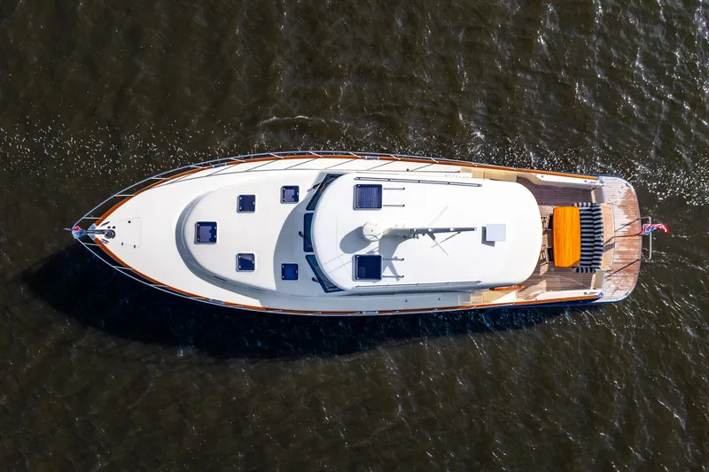 Slide: The Image of Aerial view of 2020 Palm Beach Motor Yachts PB55 cruising on water. - 43