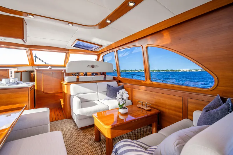 Slide: The Image of Luxurious interior of 2020 Palm Beach Motor Yachts PB55 with elegant wood finish and ocean view. - 7
