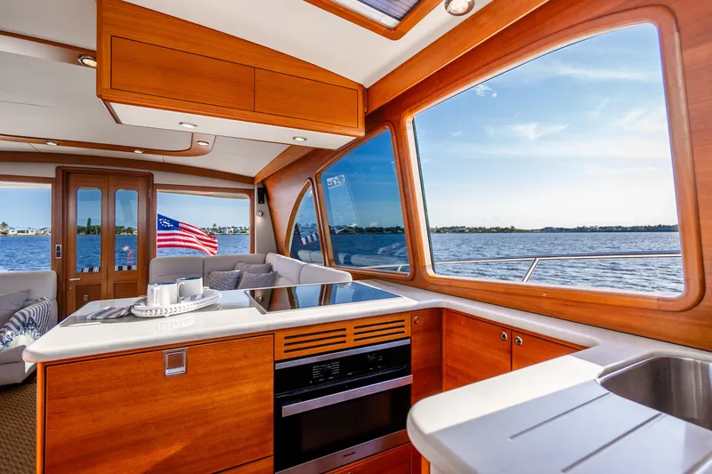 Slide: The Image of Luxurious interior of 2020 Palm Beach Motor Yachts PB55 with scenic ocean view. - 12