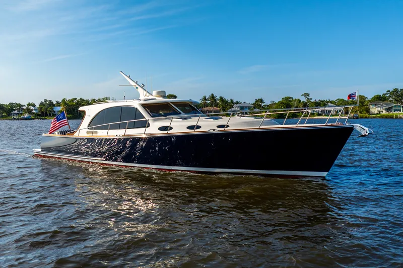 Slide: The Image of 2020 Palm Beach Motor Yachts PB55 cruising on a sunny day. - 42