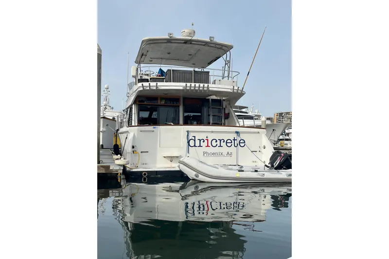 Slide: The Image of 1990 Mikelson 48 Sportfisher boat deck with davit crane and hatch. - 27