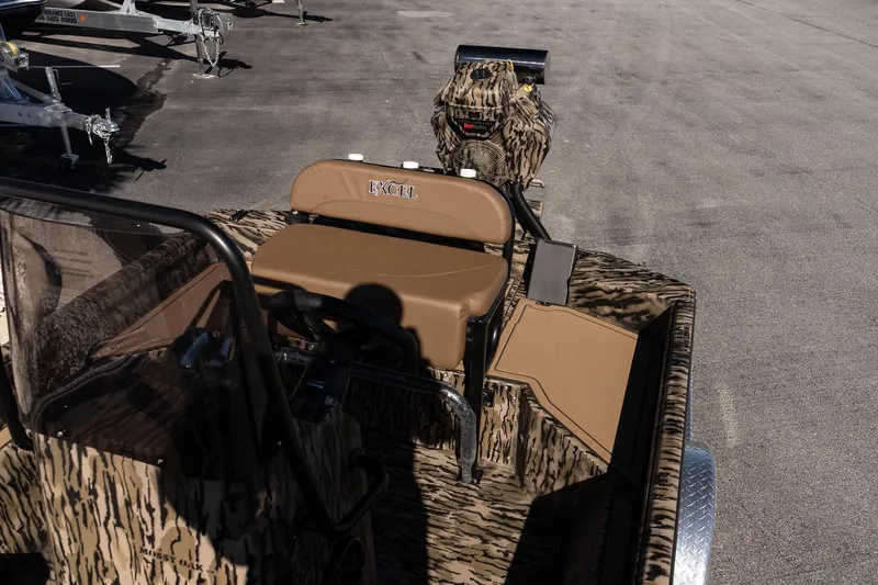 Slide: The Image of 2026 Excel 1860 Shallow Water F4 CC boat with camouflage design and seating. - 15