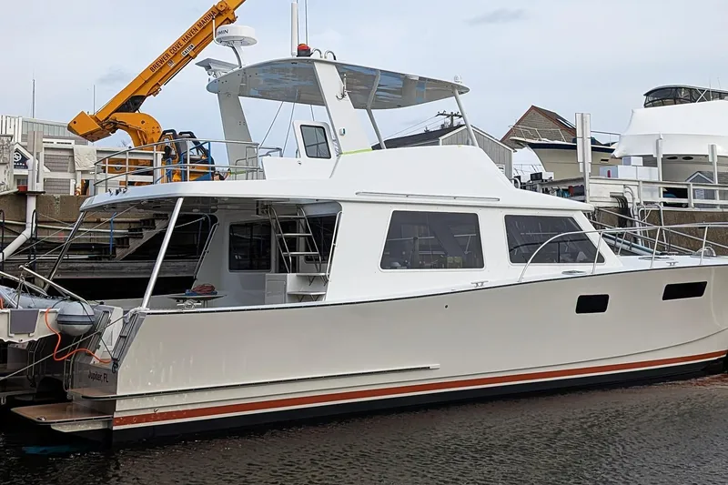 The Image of Modern 2026 Chris White Spindrift 47 yacht docked at marina. - 0