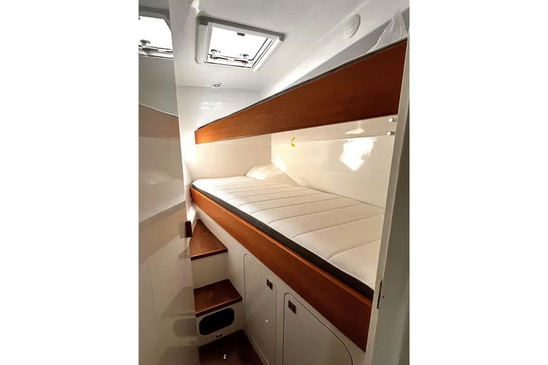 Slide: The Image of Interior cabin of 2026 Chris White Spindrift 47 yacht with wooden bunk bed. - 10